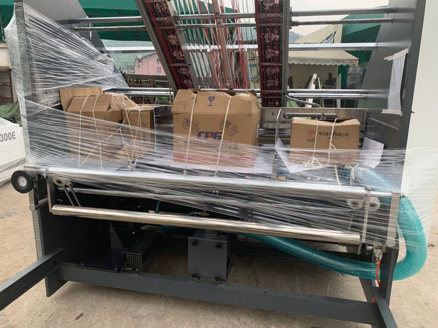YB-1650HS High speed flute laminating machine and pile turner machine delivery to Indonesia