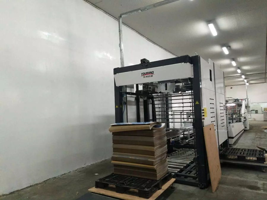 In our Jordan customer's factory: YB-1450HS servo type laminating machine and stacker